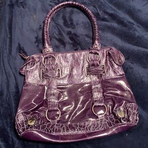 Purple faux snake skin purse
